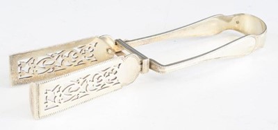 Lot 2135 - A pair of Victorian silver asparagus tongs, in...