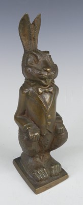 Lot 202 - A bronze figure of a novelty rabbit wearing a...