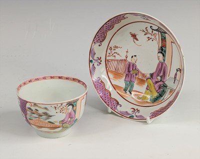 Lot 2046 - A Lowestoft porcelain tea bowl and saucer,...