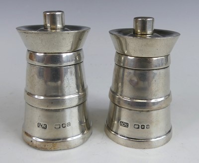 Lot 132 - A pair of 1960s silver pepper mills, each of...