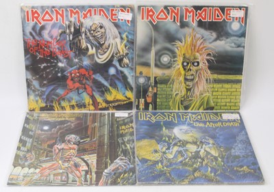 Lot 519 - Iron Maiden - A collection of six LPs, to...