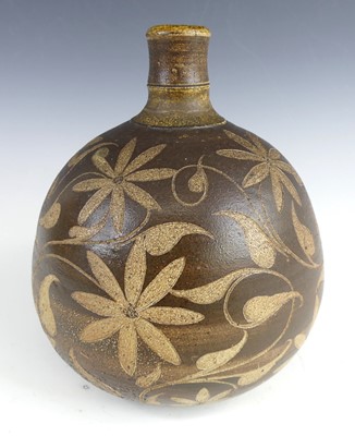 Lot 35 - Martin Brothers - a stoneware bulbous vase,...