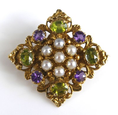 Lot 2294 - A yellow metal square shaped peridot, amethyst,...