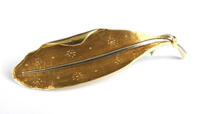 Lot 2296 - An 18ct gold stylised leaf brooch, with...