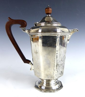 Lot 144 - An Art Deco Scottish silver hot water pot, of...