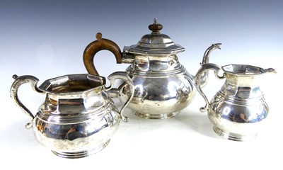 Lot 146 - An early Art Deco silver three-piece tea...