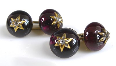 Lot 2274 - A pair of yellow metal double-ended garnet and...