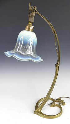 Lot 164 - A French Art Nouveau brass table lamp, with...