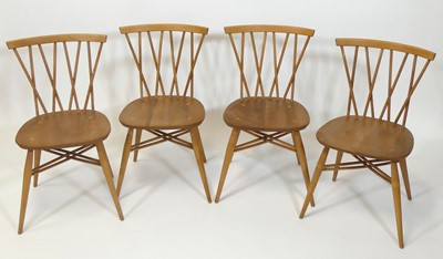 Lot 412 - A set of four 1960s Ercol light elm...