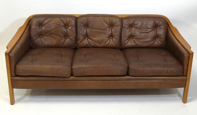 Lot 382 - A 1970s Danish teak framed three-seater sofa...