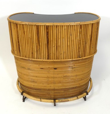 Lot 424 - A 1970s bamboo freestanding kidney shaped...