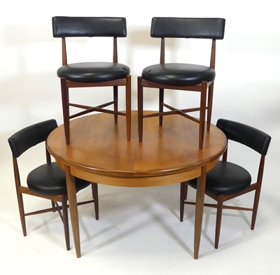 Lot 372 - A 1960s G-Plan teak 'Fresco' dining suite,...