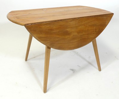 Lot 411 - A 1960s Ercol blond elm 'Windsor' model 384...