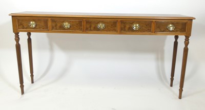 Lot 2596 - A walnut and figured walnut five drawer hall...