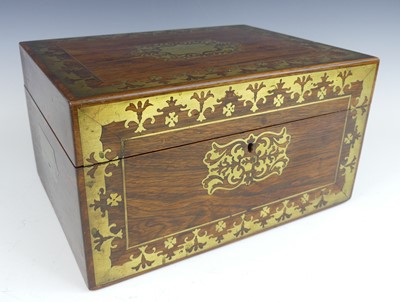 Lot 2419 - A late Regency rosewood and brass inlaid...