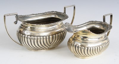 Lot 2146 - A Regency style silver twin handled sugar with...