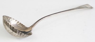 Lot 2101 - A George III silver soup ladle, in the Old...