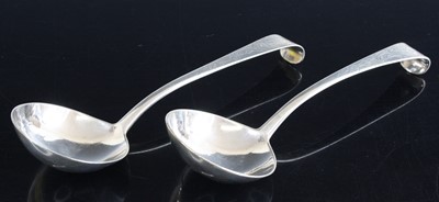 Lot 2177 - A pair of George II Irish silver sauce ladles,...