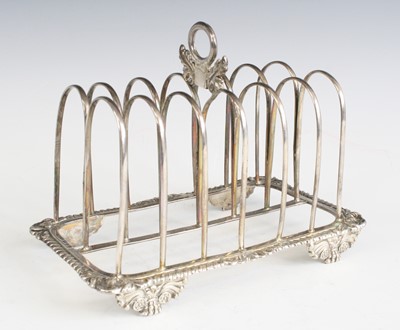 Lot 2117 - A George III silver six-division toast rack,...