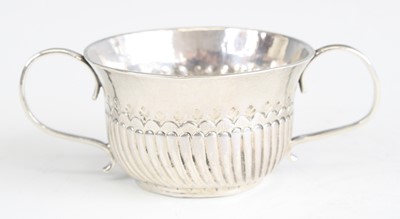 Lot 2110 - A George II silver child's porringer, the twin-...