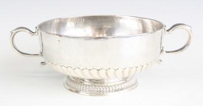 Lot 2093 - A William III silver twin-handled porringer,...