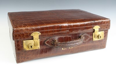 Lot 2414 - A late Victorian crocodile skin suitcase, with...