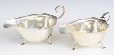 Lot 2095 - A Georgian style silver sauceboat, having...