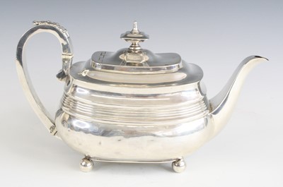 Lot 2209 - A George III silver teapot, of oval bombe form,...