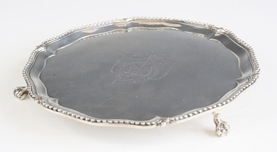 Lot 2200 - A George III silver card waiter, having a...