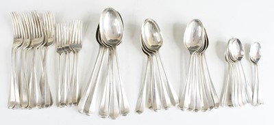 Lot 2187 - A George V silver harlequin part cutlery suite...