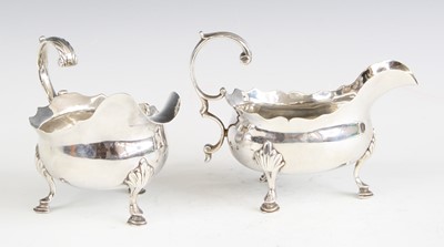 Lot 2097 - A pair of early George III silver sauceboats,...