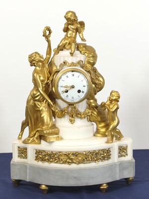 Lot 2541 - A French ormolu and white marble mantel clock...