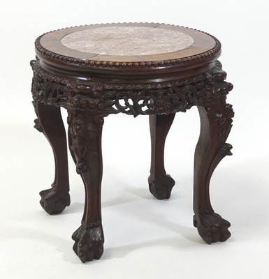 Lot 2452 - A Chinese rosewood low jardiniere stand,...