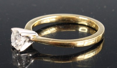 Lot 2320 - A contemporary 18ct gold diamond solitaire...