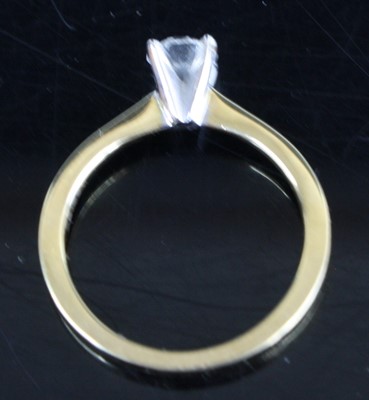 Lot 2320 - A contemporary 18ct gold diamond solitaire...