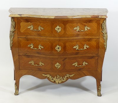 Lot 2573 - A walnut bombe commode in the Louis XV...