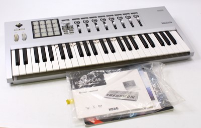 Lot 671 - A Korg Kontrol 49 Midi Studio Controller,...