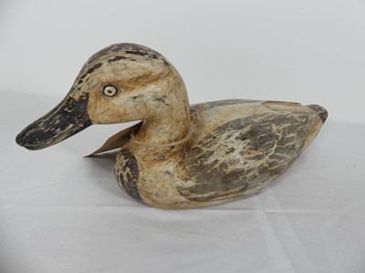 Lot 2 - A carved and painted wood decoy duck, probably...