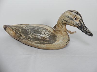 Lot 2 - A carved and painted wood decoy duck, probably...