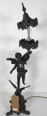 Lot 3 - A figural copper table lamp, height 79cm