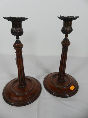 Lot 5 - A pair of brass and carved mahogany table...