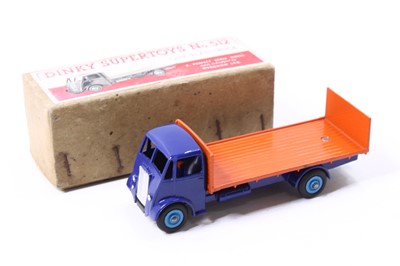 Lot 1234 - Dinky Toys, 512, Guy Flat Truck, blue cab and...