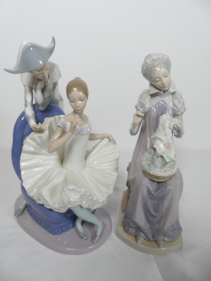 Lot 10 - A Lladro porcelain figure of a lady, shown...