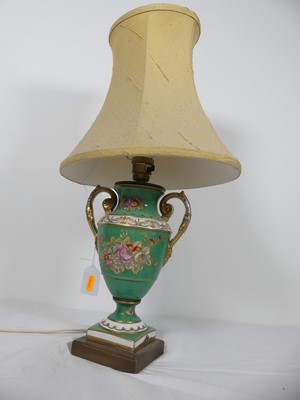 Lot 15 - A porcelain table lamp, in the form of an urn,...