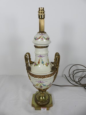 Lot 18 - A porcelain & brass mounted table lamp, of...