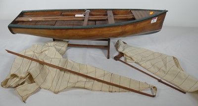 Lot 24 - A wooden model pond yacht, length 67cm