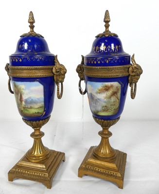 Lot 31 - A pair of 19th century porcelain and gilt...