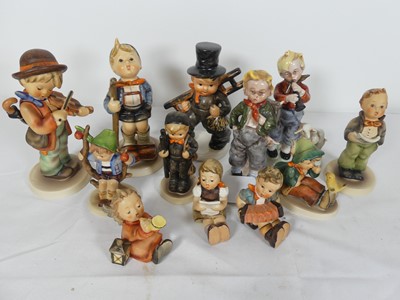 Lot 39 - A collection of Goebels pottery figures of...