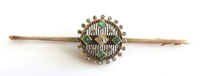 Lot 2522 - A yellow metal emerald and diamond bar brooch...