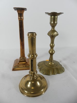 Lot 54 - An 18th century brass table candlestick,...